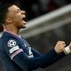 Kylian Mbappe celebrates after scoring PSG's late winner against Real Madrid