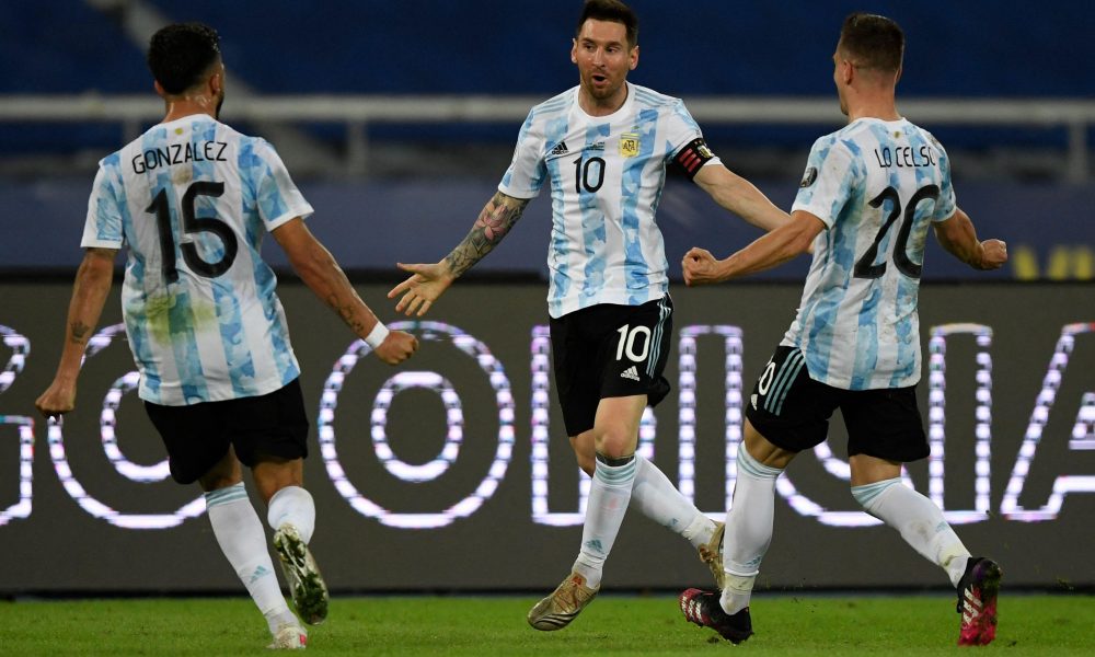 Argentina's Lionel Messi (C) celebrates with teammates Nicolas Gonzalez (L) and Giovani Lo Celso