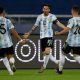 Argentina's Lionel Messi (C) celebrates with teammates Nicolas Gonzalez (L) and Giovani Lo Celso