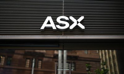 Aussie shares end week lower as mining rout continues