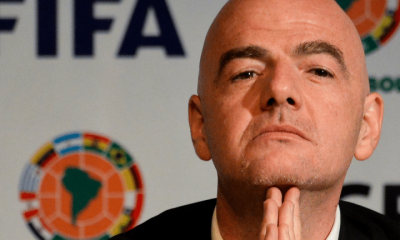 Gianni Infantino, FIFA president, with his chin resting on his fingertips while he holds his hands in prayer pose