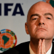Gianni Infantino, FIFA president, with his chin resting on his fingertips while he holds his hands in prayer pose