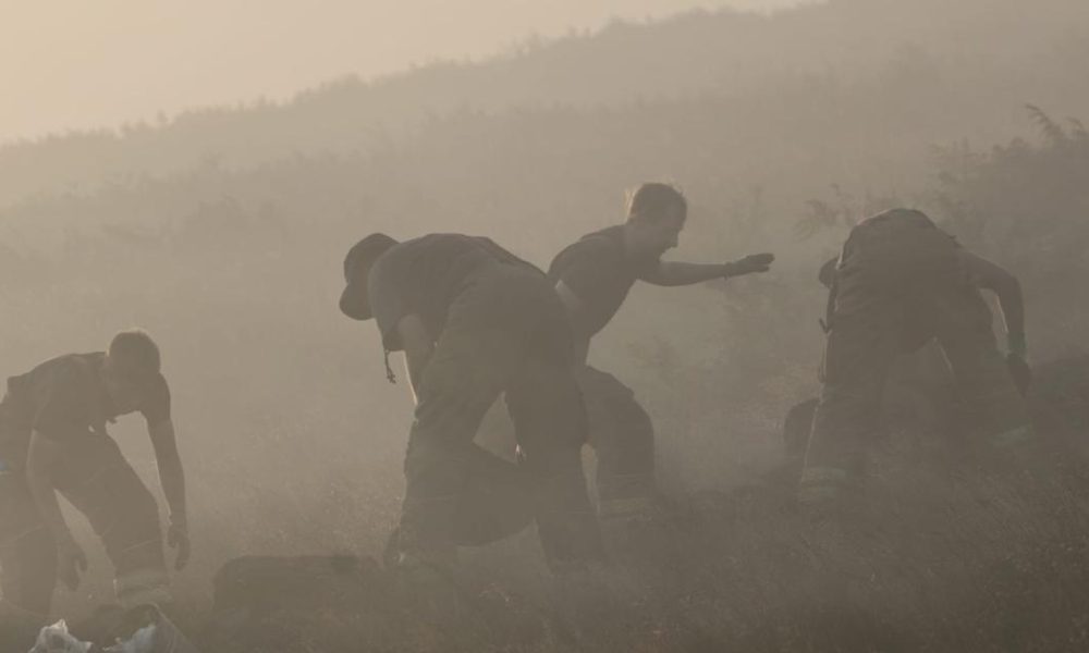 Firefighters could remain at Woodhead Pass until Sunday