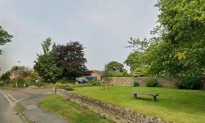 Northumberland village people pass by on the way to Alnmouth