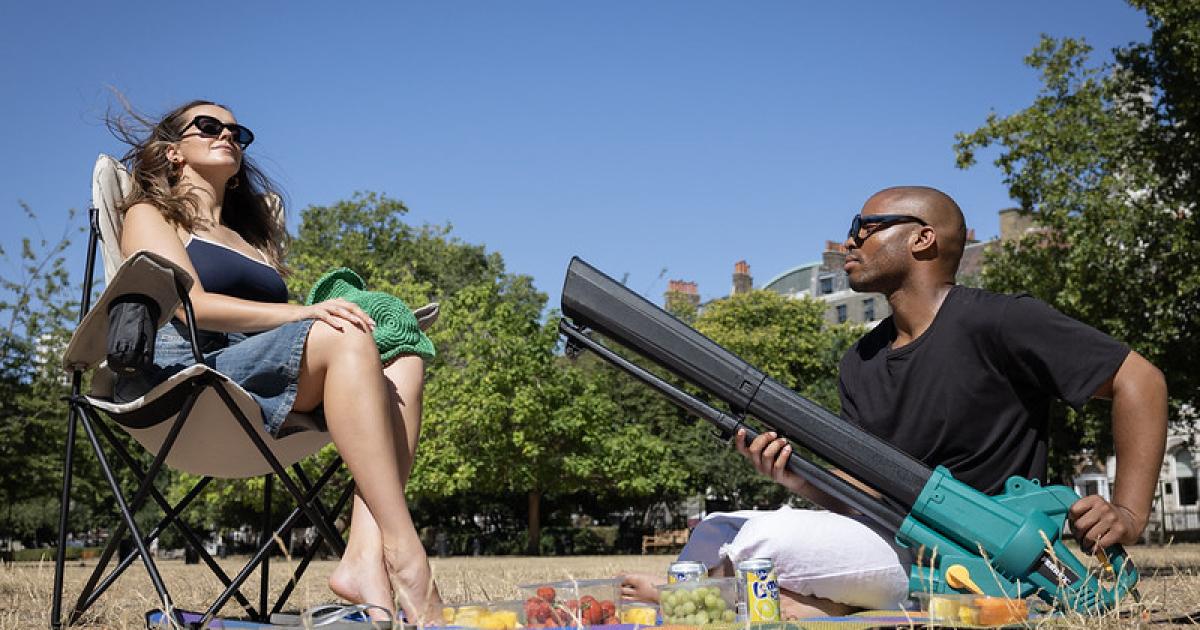 Couple using Aldi leaf blower to keep cool as temperatures soar