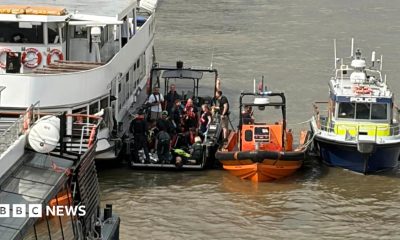 Rescue boats and a Met Police boat next to each other in the Thames.