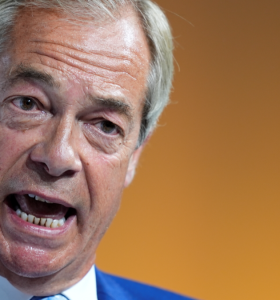 Reform UK leader Nigel Farage speaking during a conference at Olympia London in June 2026.