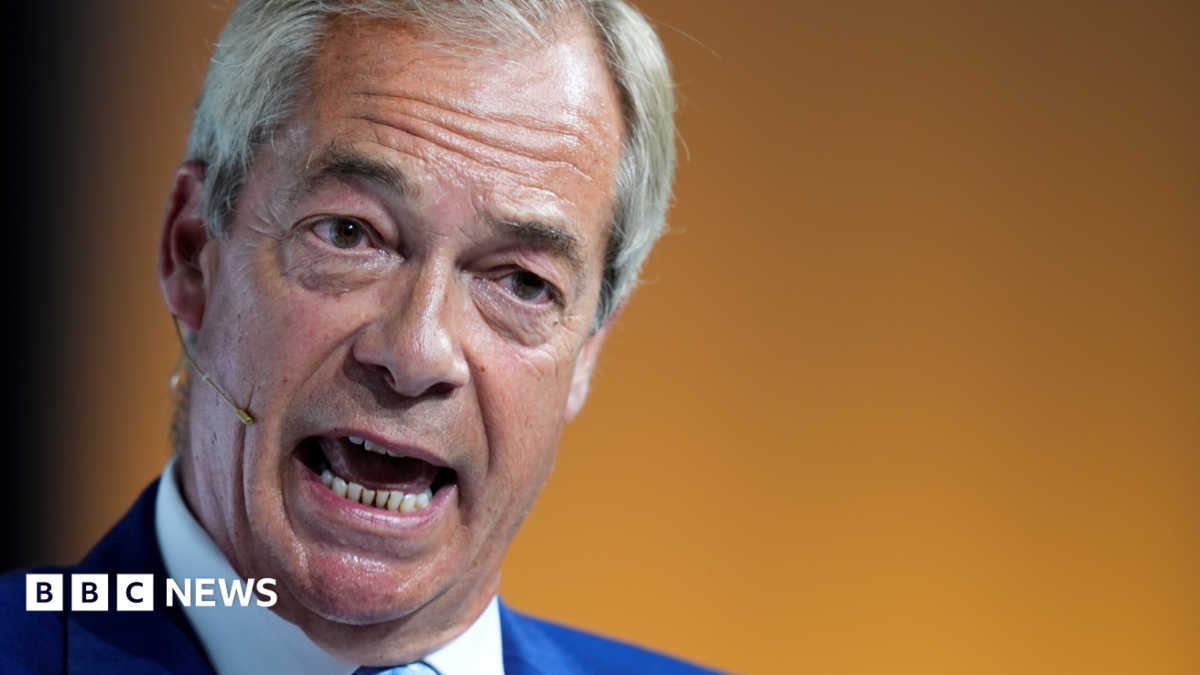 Reform UK leader Nigel Farage speaking during a conference at Olympia London in June 2026.
