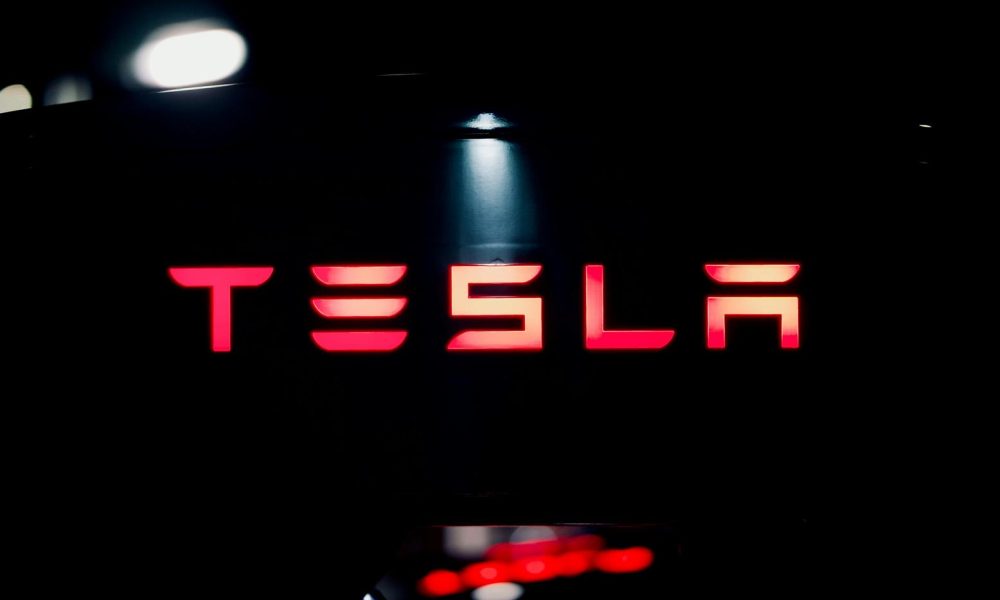 Tesla holds bitcoin steady, reports $112M impairment loss