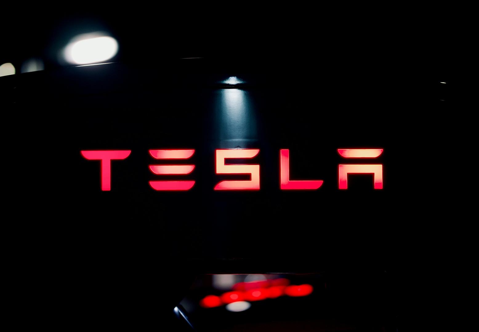 Tesla holds bitcoin steady, reports $112M impairment loss