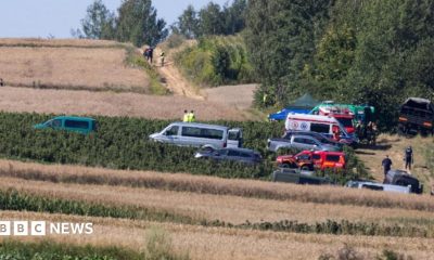 Emergency services work at the site where an unidentified flying object, believed to be a Russian cruise missile, as Ukraine's foreign minister said on Thursday, fell after violating Polish airspace