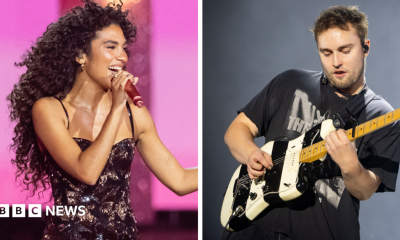 Picture of Olivia Dean on the left set against a pink backdrop, performing in a sparkly black dress with a composite of Sam Fender to the right in a black t-shirt with a black and white striped guitar.