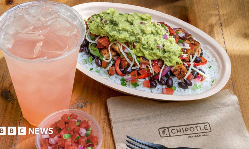 A chicken bowl from Chipotle with a drink and a dip.