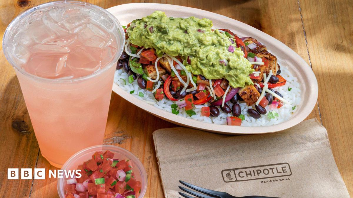 A chicken bowl from Chipotle with a drink and a dip.