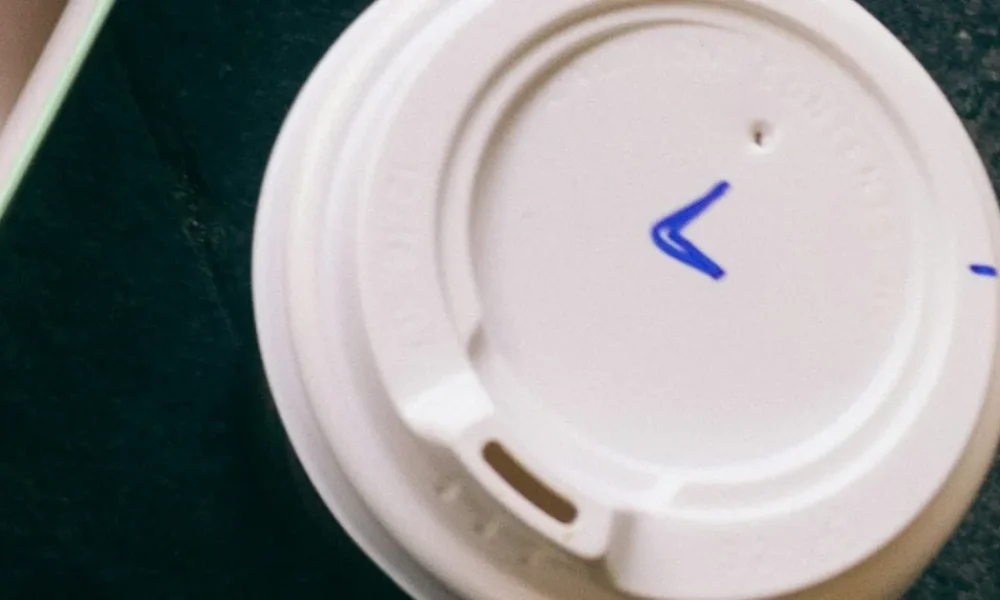 Why Takeaway Coffee Cup Lids Have A Second Tiny Hole
