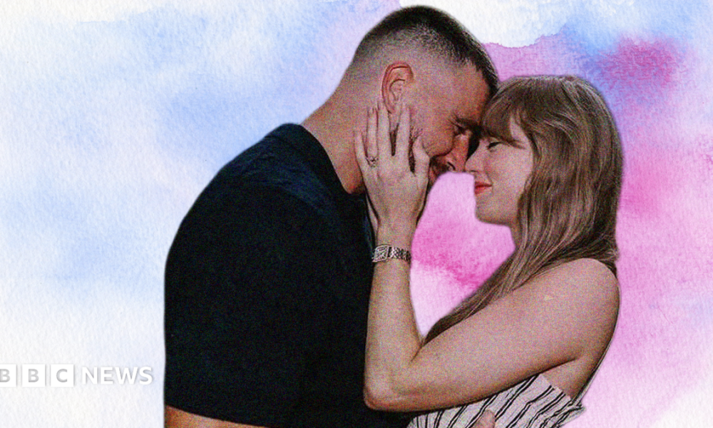 Travis Kelce and Taylor Swift embrace each other in a designed image with a blue and pink background.
