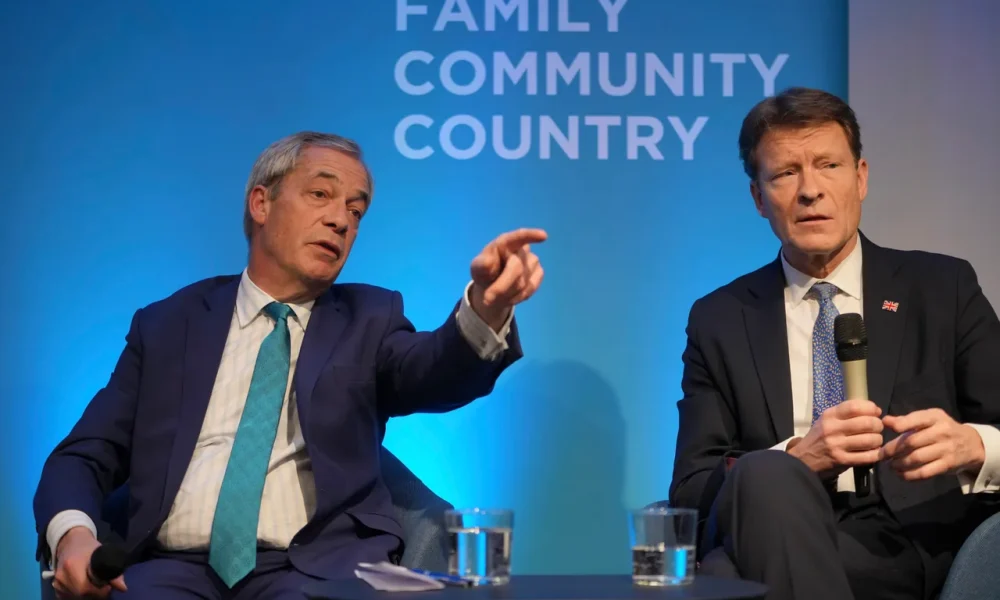 Reform UK leader Nigel Farage, left, and deputy leader Richard Tice attend a press conference on the economy and renewable energy, in London, Wednesday, Feb. 12, 2025.