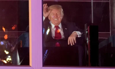 President Trump watches a fireworks show during “Salute to America 250” just past midnight on Saturday. Fourth of July celebrations dragged into the evening after severe weather prompted the evacuation of the National Mall.