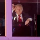 President Trump watches a fireworks show during “Salute to America 250” just past midnight on Saturday. Fourth of July celebrations dragged into the evening after severe weather prompted the evacuation of the National Mall.
