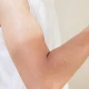 The Viral 'Tanmaxxing' Trend Is Ruining Teen Skin