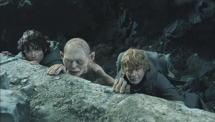 Elijah Wood and Sean Astin In The Lord Of The Rings: The Return Of The King, with Andy Serkis' character Gollum
