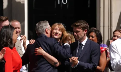 Britain's outgoing Prime Minister Keir Starmer hugs Rachel reeves as he leaves 10 Downing Street in London, Monday, July 20, 2026.(AP Photo/Kirsty Wigglesworth)
