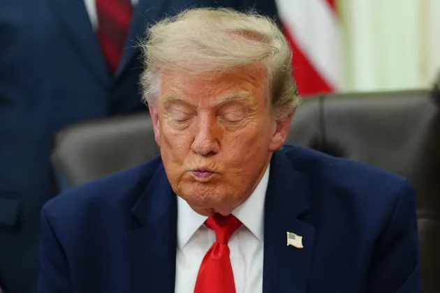 President Donald Trump speaks in the Oval Office of the White House about Dulles International Airport modernization, Wednesday, July 29, 2026, in Washington.