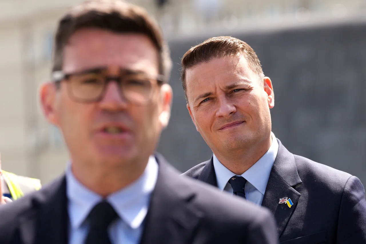 British Prime Minister Andy Burnham, foreground, and Defence Secretary Wes Streeting, right