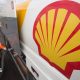 The Shell logo on a new fuel tanker truck as it delivers petrol to a gas station