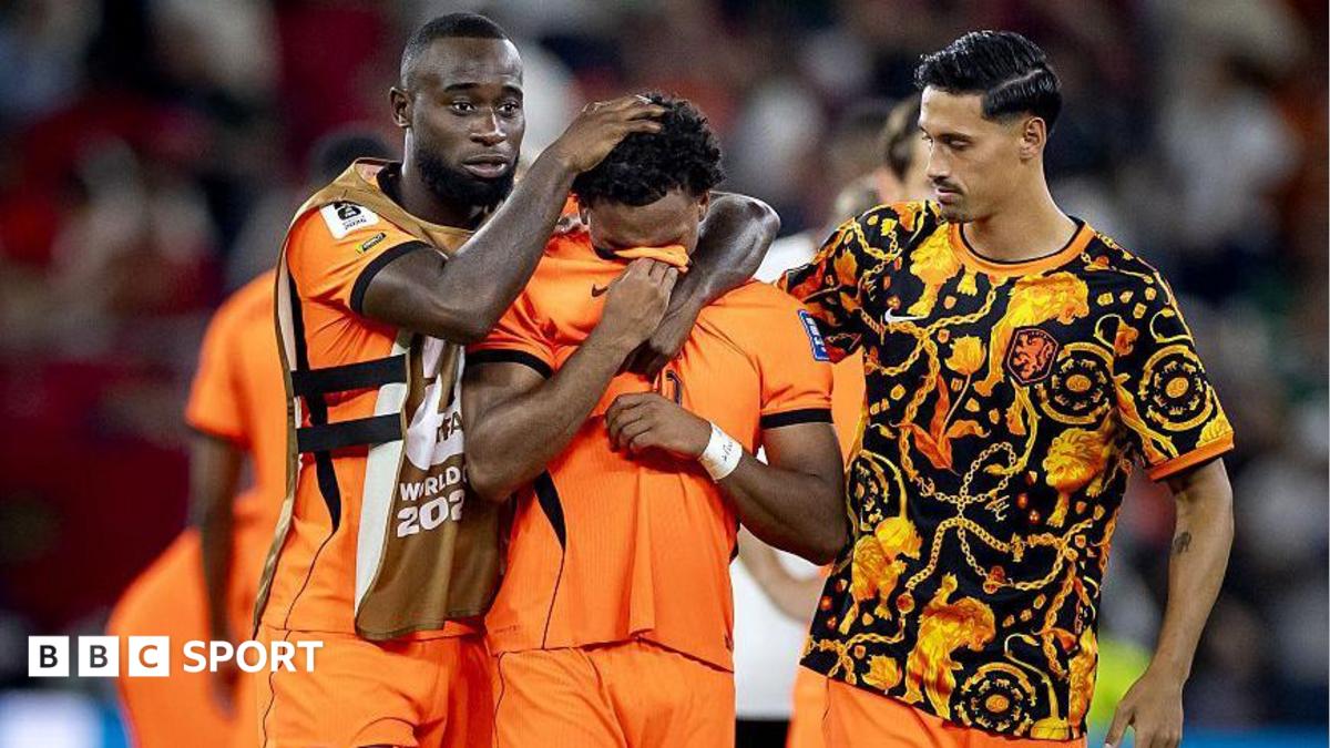 Justin Kluivert is consoled after he missed a penalty for the Netherlands in the penalty shootout against Morocco