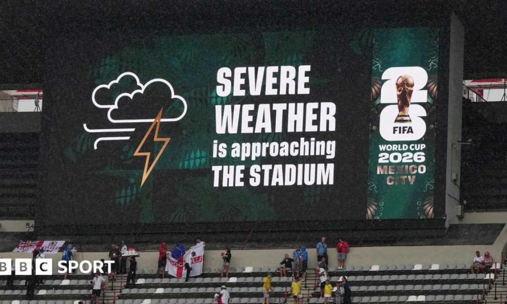 A sign displays 'Severe weather is approaching the stadium' at Mexico City's Azteca Stadium