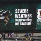 A sign displays 'Severe weather is approaching the stadium' at Mexico City's Azteca Stadium