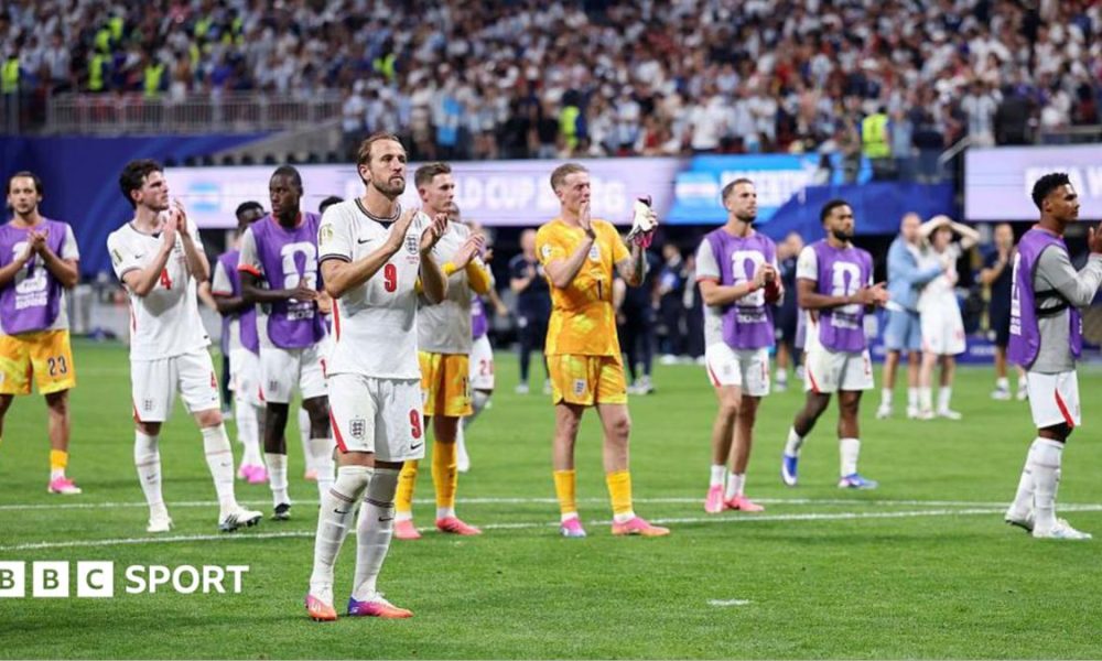 England players on the field applauding the fans after the World Cup semi-final defeat to Argentina