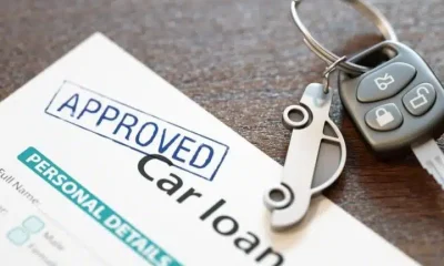 Image of car loan agreement and car key Economic abuse using car finance