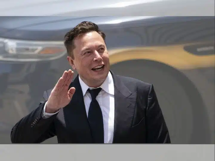 Elon Musk waving