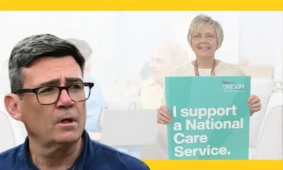 Andy Burnham mouth agape in the foreground, and a union worker holding a National Care Service sign in the background