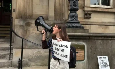 Devon Docherty of Protect the Wild protesting against NatureScot at the Biodiversity + Business Live conference at the Royal College of Physicians in Edinburgh