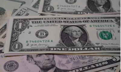 Israel: Dollar bills strewn across one another
