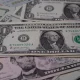 Israel: Dollar bills strewn across one another