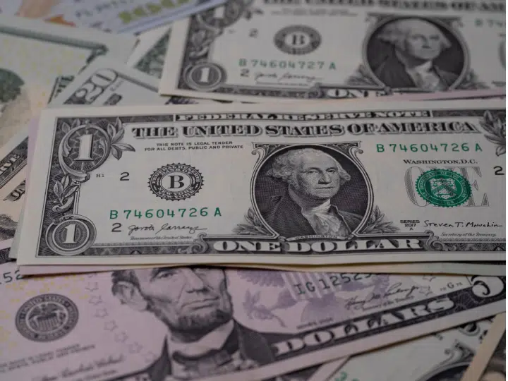Israel: Dollar bills strewn across one another