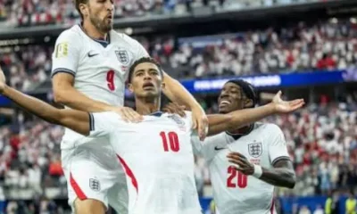 Harry Kane, Jude Bellingham and Noni Madueke celebrate on the pitch during England's winning game against Croatia on 18 July 2026