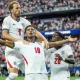 Harry Kane, Jude Bellingham and Noni Madueke celebrate on the pitch during England's winning game against Croatia on 18 July 2026