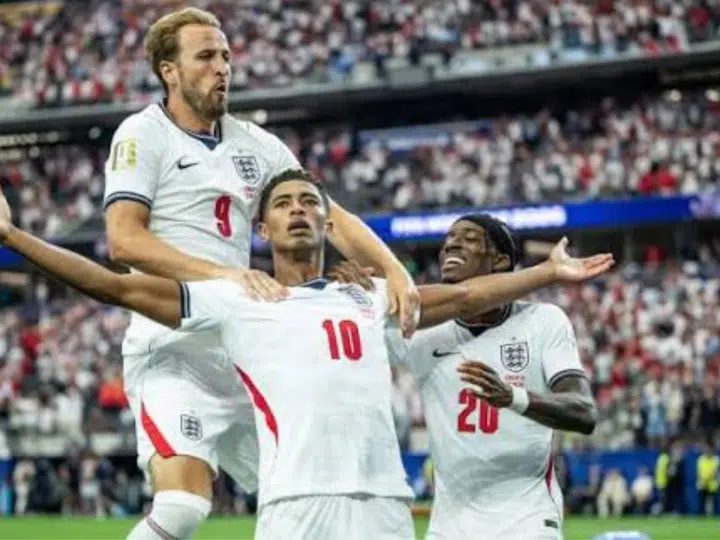 Harry Kane, Jude Bellingham and Noni Madueke celebrate on the pitch during England's winning game against Croatia on 18 July 2026