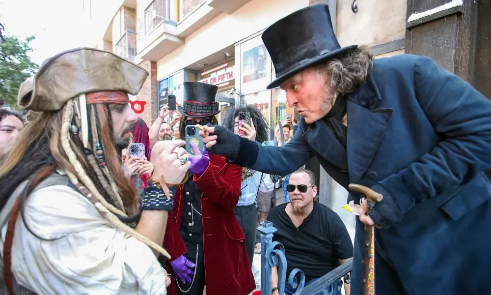 GettyImages-2287391954 Johnny Depp Looks Unrecognizable as Ebenezer Scrooge During Surprise SDCC Appearance