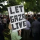 At the Great March for Gaza 2026 someone holds a placard saying 'Let Gaza Live'