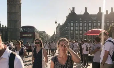 Pedestrians on Westminster Bridge in heatwave