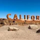 God Did! Streamer HMBL Zayy Successfully Completes His 3,000-Mile Walk To California, Raising $150K To Build A School (WATCH)