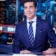 Jesse Watters dressed and ready for recording at the Fox News table