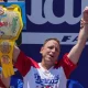 Eating champion Joey Chestnut defends title but blames heat for lower hot-dog tally