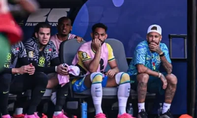 Neymar joins the Brazil team on the bench for their World Cup opener vs. Morocco